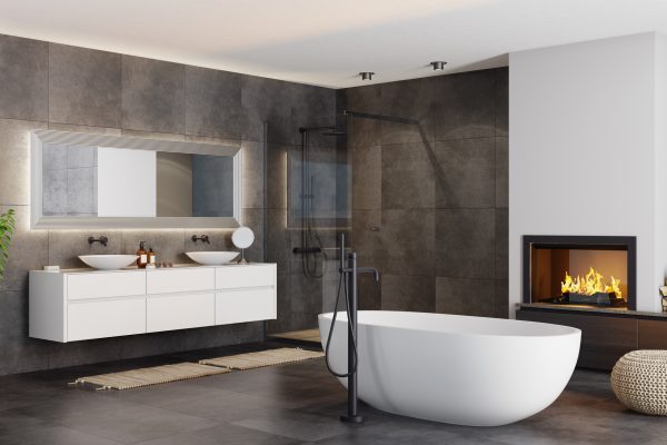 Modern and Luxurious bathroom in apartment with natural stone tiles and fireplace.